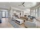 Bright and open living space with wood floors, stylish furnishings, and a welcoming atmosphere at 33 Hassayampa Trl, Henderson, NV 89052