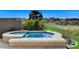 Outdoor spa has golf course views and custom landscaping at 33 Hassayampa Trl, Henderson, NV 89052