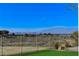 Breathtaking view of the city skyline and mountains from the backyard, offering a stunning backdrop at 33 Hassayampa Trl, Henderson, NV 89052