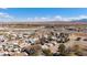 Bird's eye view of the town, featuring a mix of residential homes and scenic mountain backdrop at 352 Cox Ave, Overton, NV 89040