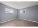 An empty bedroom with freshly painted gray walls and modern light-colored flooring at 352 Cox Ave, Overton, NV 89040