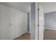 A bedroom with gray walls and wood flooring that offers a full closet at 352 Cox Ave, Overton, NV 89040