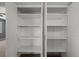 An empty white shelving closet that is bright at 352 Cox Ave, Overton, NV 89040