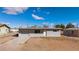 Single story home featuring simple landscaping, attached garage, and neutral color palette at 352 Cox Ave, Overton, NV 89040