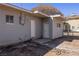 Rear exterior view of house with two doors, showing access and utility details at 352 Cox Ave, Overton, NV 89040