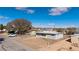A single-story home with chain link fencing, simple design, and a low maintenance yard at 352 Cox Ave, Overton, NV 89040