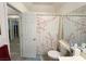 Bathroom with a shower-tub combo featuring a stylish floral shower curtain and ample space at 3550 Bay Sands Dr # 1101, Laughlin, NV 89029