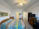 Bedroom features light wood floors, vaulted ceiling, and access to bathroom and closet areas at 3550 Bay Sands Dr # 1101, Laughlin, NV 89029