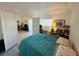 Bedroom featuring hard surface flooring with double closet and lamps at 3550 Bay Sands Dr # 1101, Laughlin, NV 89029