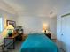 Bright bedroom featuring hard surface flooring with a lamp-lit desk at 3550 Bay Sands Dr # 1101, Laughlin, NV 89029
