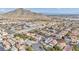 Neighborhood aerial shot featuring a school and panoramic mountain views at 3728 Russell Peterson Ct, Las Vegas, NV 89129