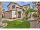 Charming two-story home with a well-maintained lawn and inviting curb appeal at 3728 Russell Peterson Ct, Las Vegas, NV 89129
