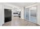 Spacious kitchen with stainless steel appliances, gray cabinets, and sliding glass door at 3944 Visby Ln, Las Vegas, NV 89119