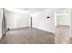 Large living room with hardwood floors and freshly painted walls at 3944 Visby Ln, Las Vegas, NV 89119