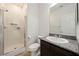 Bathroom featuring walk-in shower, granite countertop vanity, and ceramic tile flooring at 3981 E Teller Dr, Pahrump, NV 89061