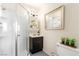 Clean and modern bathroom with a glass-enclosed shower, stylish vanity, and contemporary decor at 432 Bottle Brush Way, Henderson, NV 89015