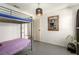 Cozy ' bedroom with a bunk bed and charming decor, including a decorative mirror at 432 Bottle Brush Way, Henderson, NV 89015