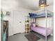 This bedroom features a bunk bed, decor and a rug at 432 Bottle Brush Way, Henderson, NV 89015