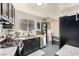 Kitchen features stainless appliances, granite counters, and a breakfast nook at 432 Bottle Brush Way, Henderson, NV 89015