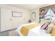 Main bedroom featuring a decorative window, light gray walls, and modern decor at 432 Bottle Brush Way, Henderson, NV 89015