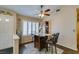 Charming dining area boasts a bar-height table with chairs, and a decorative display cabinet at 455 Paulson Dr, Las Vegas, NV 89123