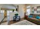 Cozy living room with wood floors, plantation shutters, neutral walls, and comfortable seating at 455 Paulson Dr, Las Vegas, NV 89123