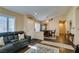 Inviting living room with wood floors, plantation shutters, and comfortable seating arrangement at 455 Paulson Dr, Las Vegas, NV 89123