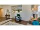 Bright living room features wood floors, modern decor, and neutral paint for a welcoming atmosphere at 455 Paulson Dr, Las Vegas, NV 89123