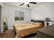 Cozy bedroom features a full sized bed, carpet, and blinds at 4850 Straight Flush Dr # 103, Las Vegas, NV 89122
