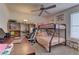 bedroom with bunk beds, ceiling fan, desk and study area at 5161 Lindell Rd # 201, Las Vegas, NV 89118