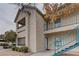 Two story home with well maintained landscaping and stairs to balcony at 5161 Lindell Rd # 201, Las Vegas, NV 89118