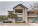 A beautiful view of the home exterior showcasing well maintained shrubs and a balcony at 5161 Lindell Rd # 201, Las Vegas, NV 89118