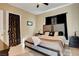 Comfortable bedroom featuring stylish furnishings and blackout curtains at 563 Moon Chase St, Las Vegas, NV 89110