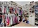 Spacious walk-in closet with custom storage options and plenty of room for shoes and apparel at 563 Moon Chase St, Las Vegas, NV 89110