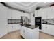 Spacious, bright kitchen with granite countertops, an island, stainless steel appliances, and plenty of storage at 563 Moon Chase St, Las Vegas, NV 89110