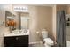 Well-lit bathroom with a shower-tub combo and a vanity with ample counter space at 6255 W Arby Ave # 183, Las Vegas, NV 89118