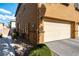 Attached two-car garage with driveway and street parking at 6255 W Arby Ave # 183, Las Vegas, NV 89118