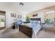 Comfortable bedroom with a cozy wooden bed and lots of natural light at 653 Freeburg Pl, Las Vegas, NV 89123