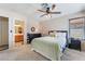 Spacious bedroom suite features ensuite bathroom and natural light at 653 Freeburg Pl, Las Vegas, NV 89123