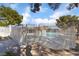 Community pool area enclosed by a fence at 653 Freeburg Pl, Las Vegas, NV 89123