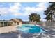 Community pool and pool house on a sunny day at 653 Freeburg Pl, Las Vegas, NV 89123