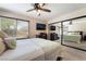 Comfortable main bedroom with large mirror closet and entertainment center at 653 Freeburg Pl, Las Vegas, NV 89123