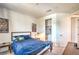 Bedroom with bed, two windows, and Marvel-themed decor at 6593 Corsari Ridge St, Las Vegas, NV 89166