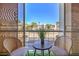 Cozy balcony with seating and a view of the surrounding neighborhood at 725 N Royal Crest Cir # 227, Las Vegas, NV 89169
