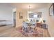 Comfortable dining area with ample light and an adjacent serving bar at 725 N Royal Crest Cir # 227, Las Vegas, NV 89169