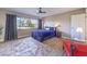 Comfortable main bedroom featuring a plush bed, large window, and ample space at 725 N Royal Crest Cir # 227, Las Vegas, NV 89169