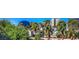 Scenic view showcasing mature landscaping, surrounding buildings, and blue skies at 725 N Royal Crest Cir # 227, Las Vegas, NV 89169