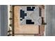 An aerial view of a home with solar panels and a large, private backyard, conveniently located near a quiet street at 7255 Bold Rock Ave, Las Vegas, NV 89113
