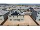 Aerial view of a home showcasing solar panels, a large backyard, and neighborhood context at 7255 Bold Rock Ave, Las Vegas, NV 89113