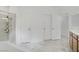 This spacious bathroom has a glass shower, soaking tub, and double-door closet at 7255 Bold Rock Ave, Las Vegas, NV 89113